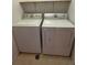 Stackable washer and dryer in a dedicated laundry room at 4860 Bluesky Dr, Castle Rock, CO 80109