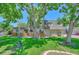 Townhouse exterior with fenced patio and landscaping at 6885 E Arizona Avenue # D, Denver, CO 80224