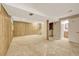 Spacious finished basement with bathroom and laundry area at 6885 E Arizona Avenue # D, Denver, CO 80224