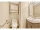 Updated bathroom with modern vanity and a large mirror at 6885 E Arizona Avenue # D, Denver, CO 80224
