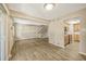 Open concept dining area with kitchen access and laminate floors at 6885 E Arizona Avenue # D, Denver, CO 80224