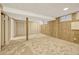 Finished basement with closets and neutral carpeting at 6885 E Arizona Avenue # D, Denver, CO 80224