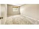 Spacious bedroom with neutral carpet and large window at 6885 E Arizona Avenue # D, Denver, CO 80224