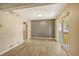 Dining area with laminate wood floor and access to a patio at 6885 E Arizona Avenue # D, Denver, CO 80224