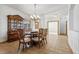 Open dining area with tile floors and access to the entryway at 8129 S Algonquian Cir, Aurora, CO 80016