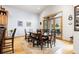 Casual dining area with a large table and access to a deck at 5881 Deer Meadow Trl, Golden, CO 80403