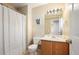 Clean bathroom with single sink and shower/tub combo at 9758 Laredo St # 25B, Commerce City, CO 80022