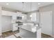 Modern kitchen with white cabinets and granite countertops at 18097 Dandy Brush Ln, Parker, CO 80134