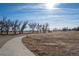 Paved walking path through a park-like setting at 9396 Garfield St, Thornton, CO 80229