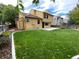 Large backyard with a grassy lawn and a patio at 7202 S Mount Holy Cross, Littleton, CO 80127