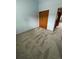 Light blue bedroom with carpet and double door closet at 7202 S Mount Holy Cross, Littleton, CO 80127