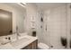 Clean bathroom with a shower and modern vanity at 2313 S High St, Denver, CO 80210