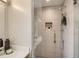 Modern bathroom with a large walk-in shower and tiled walls at 2313 S High St, Denver, CO 80210