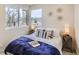 Bright bedroom with a comfortable bed and city view at 2313 S High St, Denver, CO 80210