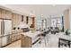 Modern kitchen with stainless steel appliances and ample counter space at 2313 S High St, Denver, CO 80210