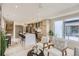 Modern kitchen with island, stainless steel appliances, and breakfast bar at 2313 S High St, Denver, CO 80210