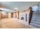 Finished basement with fireplace and ample living space at 2523 W Wesley Ave, Denver, CO 80219