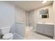 Basement bathroom with a shower/tub combo and vanity at 7000 S Sheridan Blvd, Littleton, CO 80128