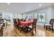 Formal dining room with hardwood floors and large window at 7000 S Sheridan Blvd, Littleton, CO 80128