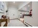 Bright entryway with hardwood floors and double doors at 7000 S Sheridan Blvd, Littleton, CO 80128