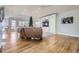 Spacious living room with hardwood floors and vaulted ceiling at 7000 S Sheridan Blvd, Littleton, CO 80128