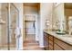 Bathroom with shower, granite countertop, and walk-in closet at 830 W 128Th Pl, Westminster, CO 80234