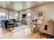 Spacious living room with navy sofas and a large wall mirror at 830 W 128Th Pl, Westminster, CO 80234