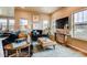 Bright living room featuring comfortable seating and large windows at 830 W 128Th Pl, Westminster, CO 80234