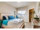 Cozy bedroom with window seat and adjoining closet at 830 W 128Th Pl, Westminster, CO 80234