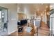 Home office with built-in desk and sliding glass door to patio at 830 W 128Th Pl, Westminster, CO 80234