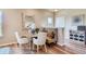 Dining area with a built-in bench and a small round table at 830 W 128Th Pl, Westminster, CO 80234