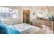 Bright bedroom with walk-in closet and large window at 830 W 128Th Pl, Westminster, CO 80234