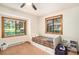 Cozy bedroom featuring a trundle bed and ample natural light at 28192 Shadow Mountain Dr, Conifer, CO 80433