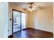 Dining area with hardwood floors and sliding glass door to patio at 62 S Holman Way # 62, Golden, CO 80401