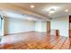 Spacious living room with terracotta tile floors at 62 S Holman Way # 62, Golden, CO 80401