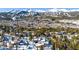 Aerial view of home with mountain views and snowy landscape at 132 N Gold Flake Ter, Breckenridge, CO 80424