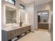 Modern bathroom with double vanity and walk-in shower at 132 N Gold Flake Ter, Breckenridge, CO 80424