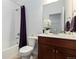 Clean bathroom with tub, toilet, and vanity at 9785 Mount Kataka Pt, Littleton, CO 80125