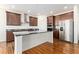 Modern kitchen with stainless steel appliances and island at 9785 Mount Kataka Pt, Littleton, CO 80125