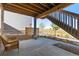 Covered patio off basement with a view of open space at 9785 Mount Kataka Pt, Littleton, CO 80125