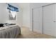 Cozy bedroom with double bed and closet at 9785 Mount Kataka Pt, Littleton, CO 80125