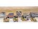 Aerial view of several homes with solar panels and landscaping at 9785 Mount Kataka Pt, Littleton, CO 80125