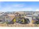 Two-story house with backyard deck and mountain views at 9785 Mount Kataka Pt, Littleton, CO 80125