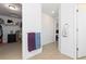 Spacious hallway with linen closet and access to other rooms at 9785 Mount Kataka Pt, Littleton, CO 80125