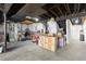 Unfinished basement with storage and utility area at 9785 Mount Kataka Pt, Littleton, CO 80125