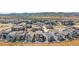 Aerial view of homes with mountain views and community at 9785 Mount Kataka Pt, Littleton, CO 80125