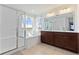 Main bathroom boasts a soaking tub, walk-in shower, and double vanity at 9785 Mount Kataka Pt, Littleton, CO 80125