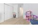 Spacious bedroom with carpeting, closet and room for toys at 9785 Mount Kataka Pt, Littleton, CO 80125