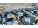 Aerial view of neighborhood with houses and snowy landscape at 4072 N Rome St, Aurora, CO 80019