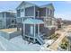 Modern two-story home with snow covered walkway at 4072 N Rome St, Aurora, CO 80019